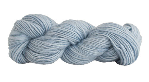 Skein of Manos del Uruguay Silk Blend DK weight yarn in the color Powder (Blue) for knitting and crocheting.