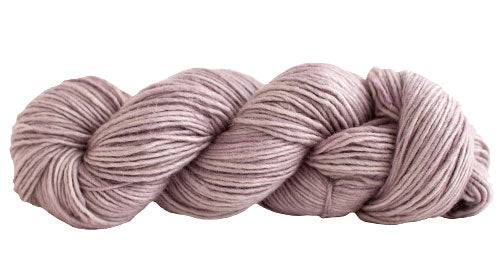 Skein of Manos del Uruguay Silk Blend DK weight yarn in the color Shale (Pink) for knitting and crocheting.