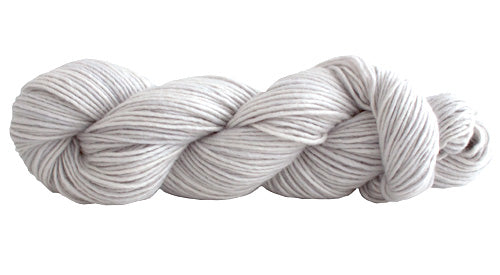 Skein of Manos del Uruguay Silk Blend DK weight yarn in the color Silver (Gray) for knitting and crocheting.