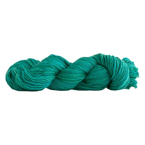 Skein of Manos del Uruguay Silk Blend DK weight yarn in the color Tahiti (Green) for knitting and crocheting.