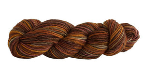 Skein of Manos del Uruguay Silk Blend Space-Dyed DK weight yarn in the color Prairie (Brown) for knitting and crocheting.