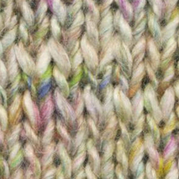 Skein of Noro Silk Garden Solo Worsted weight yarn in the color Omitama (White) for knitting and crocheting.