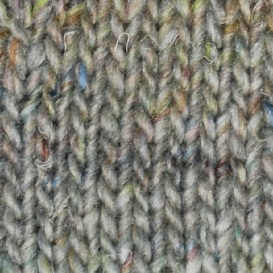 Skein of Noro Silk Garden Solo Worsted weight yarn in color Shiroi (Gray) for knitting and crocheting.