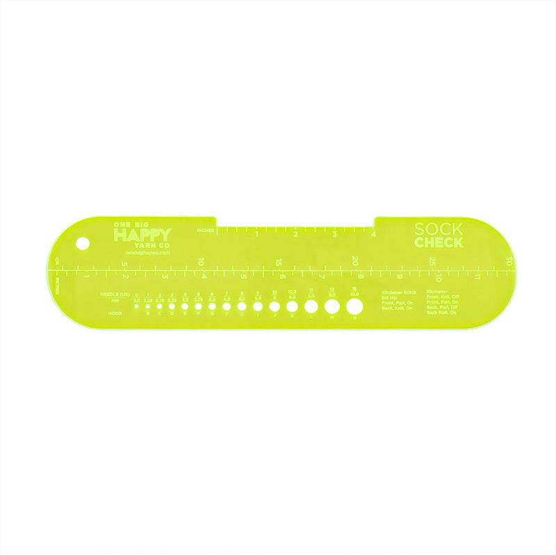 A neon yellow oval-shaped ruler is shown, with measurements in inches, centimeters, and a gauge check for hooks and needles. 