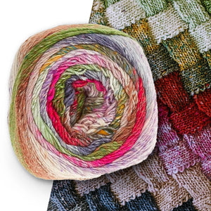 A yarn ball with all of the colors in Noro Tsubame color 02 Kamaishi  (pink, gray, orange, green, brown)is shown. 