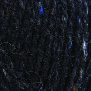Skein of Rowan Felted Tweed DK DK weight yarn in the color Black (Black) for knitting and crocheting.