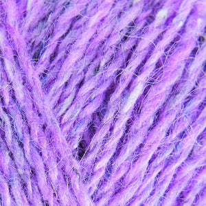 Skein of Rowan Felted Tweed DK DK weight yarn in the color Candy Floss (Purple) for knitting and crocheting.
