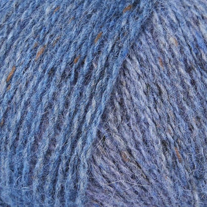 Skein of Rowan Felted Tweed Color DK weight yarn in color Frost (Gray) for knitting and crocheting.