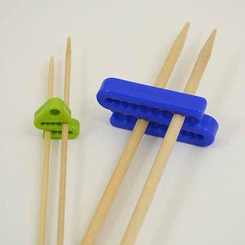 plastic knitting needle holders by the Tempestry Project. 