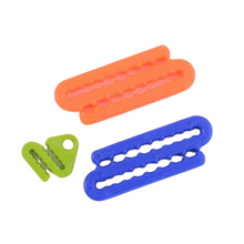 Load image into Gallery viewer, Set of 3 plastic knitting needle holders by the Tempestry Project. 
